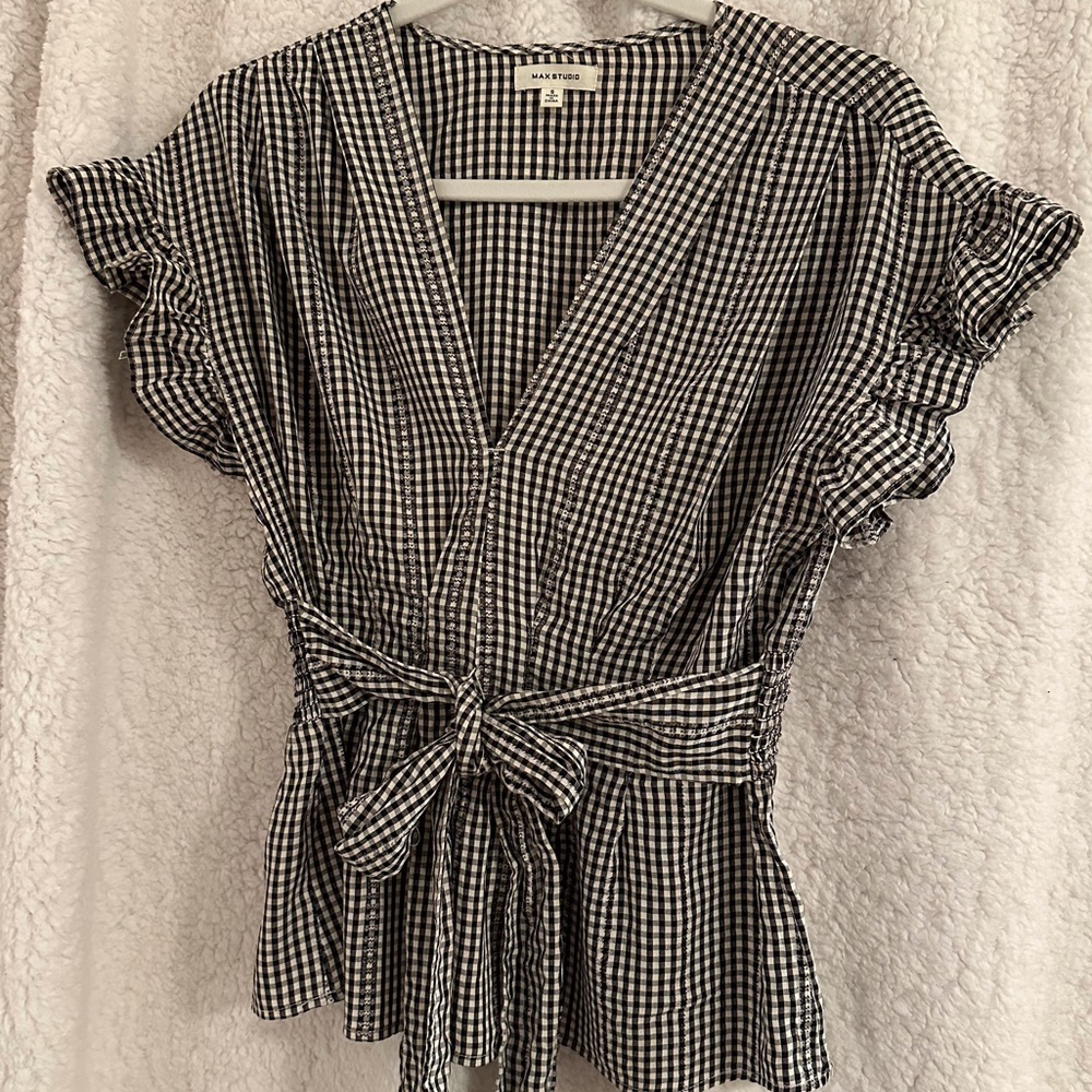 Polyester/rayon blend pullover top.